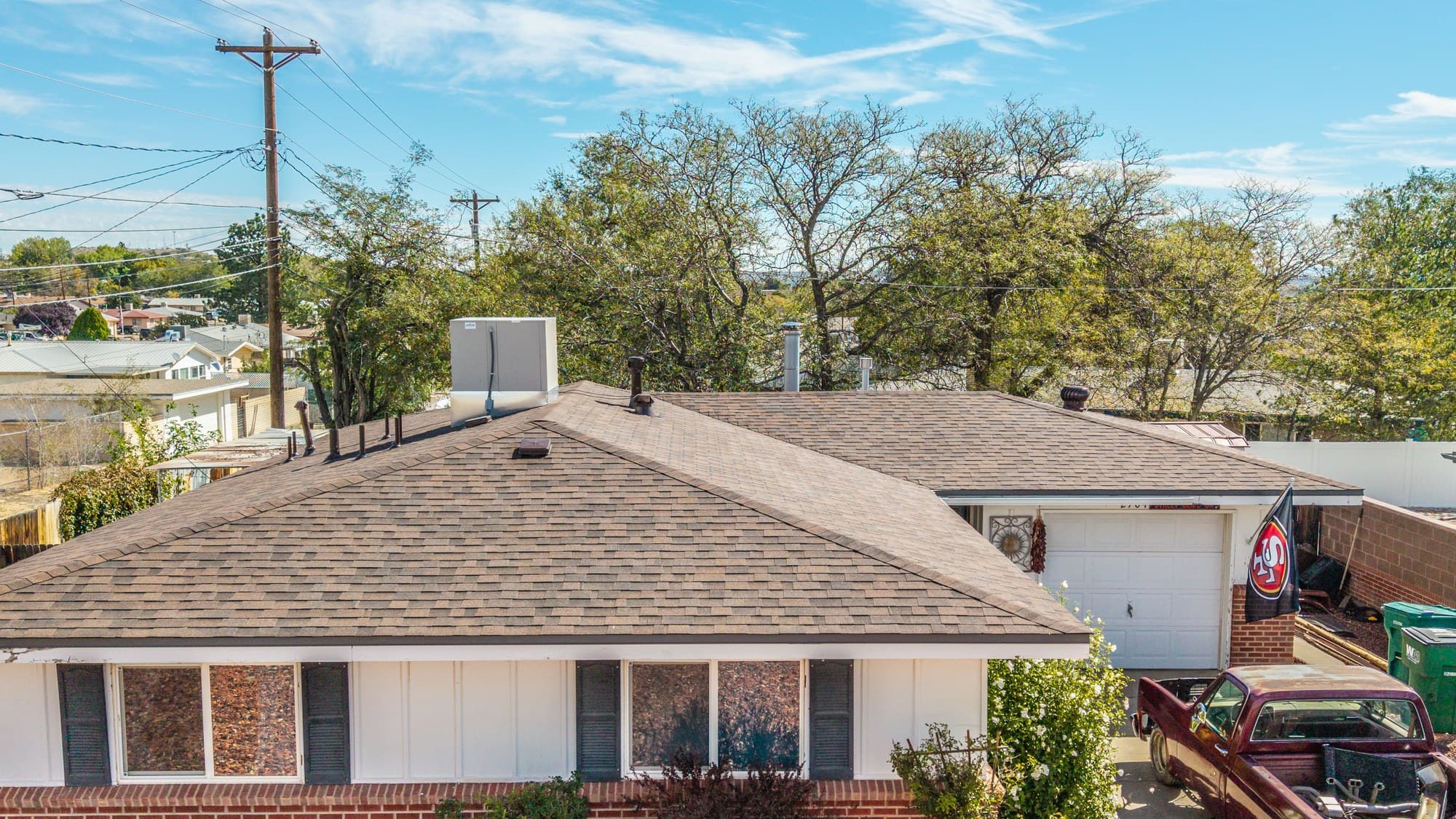Completed residential roof replacement in Farmington, New Mexico by Regal Roofing LLC
